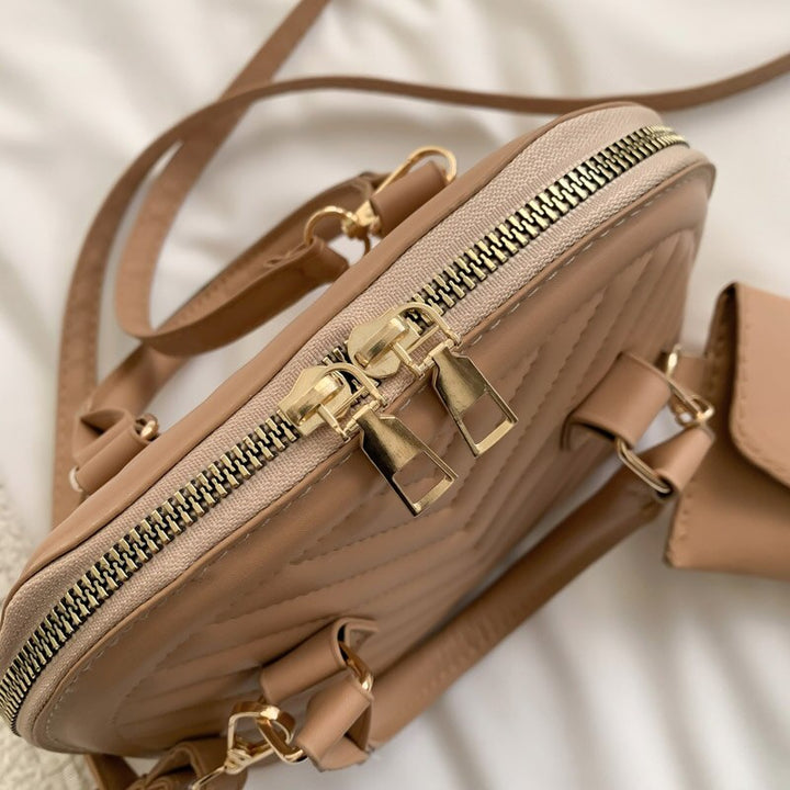 תיק יד גיוזה- טיילור