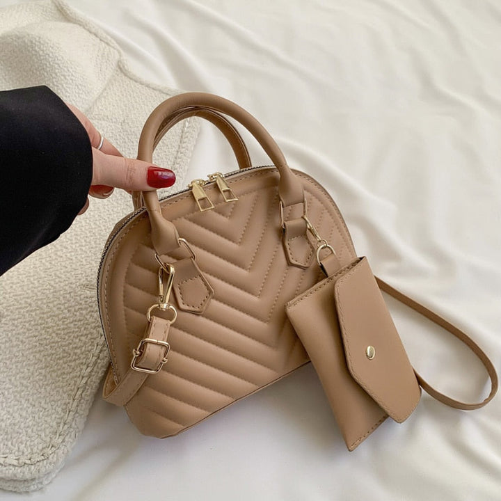 תיק יד גיוזה- טיילור