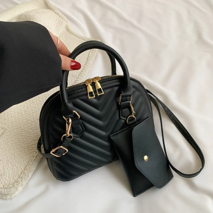 תיק יד גיוזה- טיילור