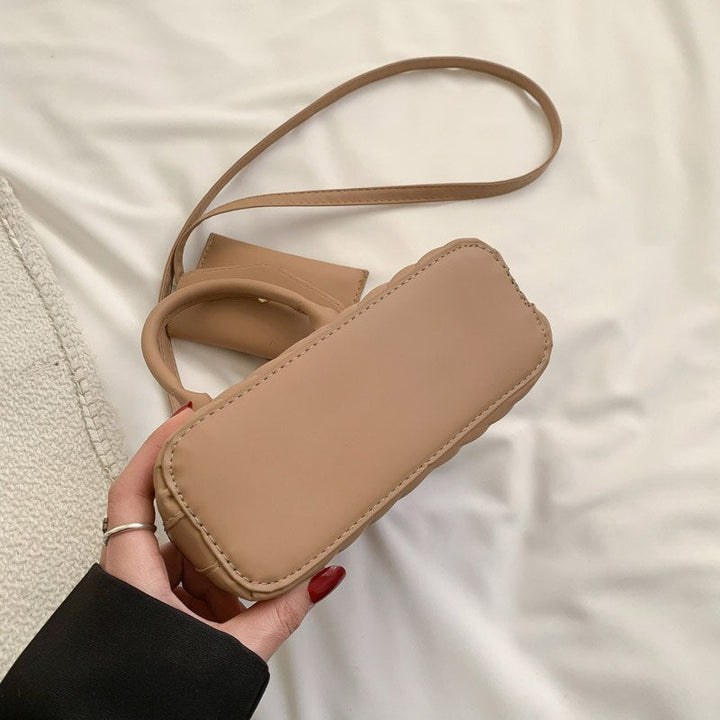 תיק יד גיוזה- טיילור