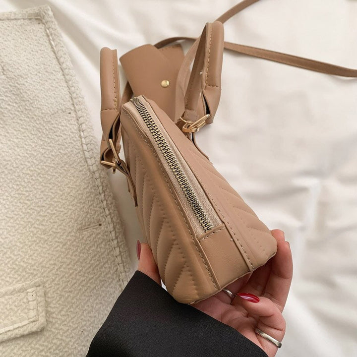 תיק יד גיוזה- טיילור