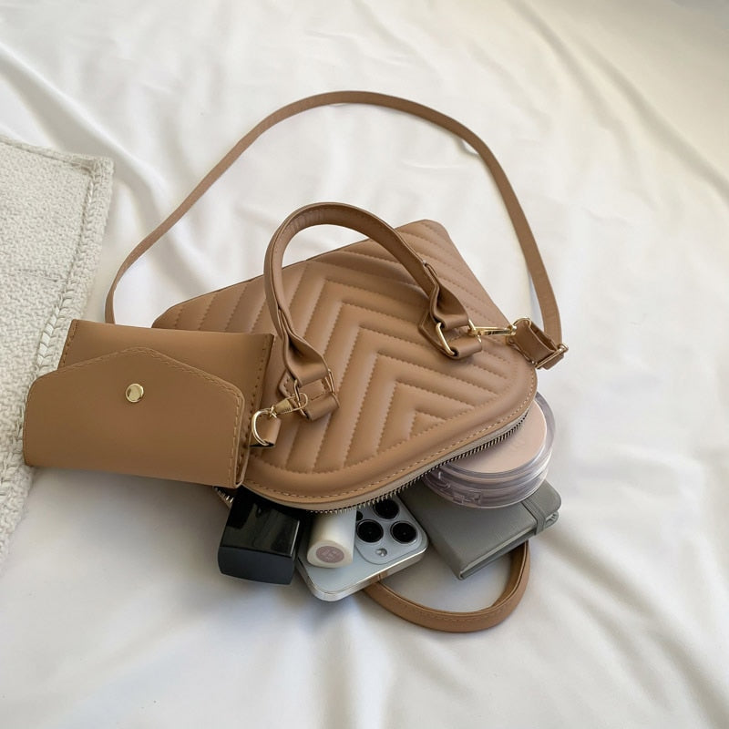 תיק יד גיוזה- טיילור