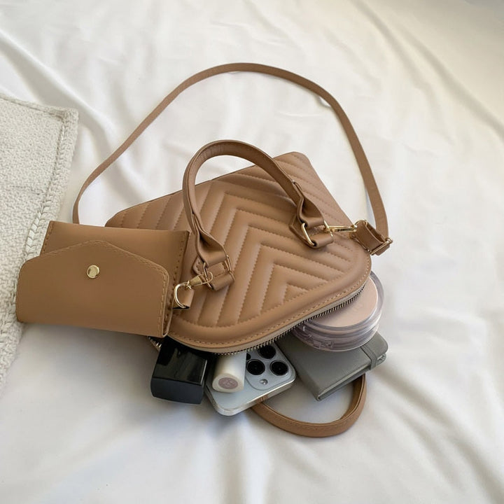 תיק יד גיוזה- טיילור